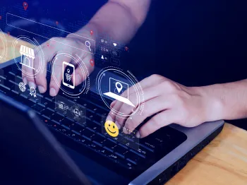 Person using a laptop to access local business contact and service information online
